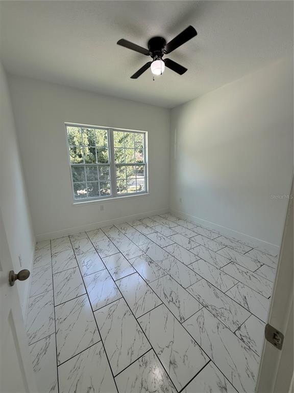 2314 Apache Avenue Kissimmee, FL 34744 - Photo 24 of 29 a view of an empty room and window