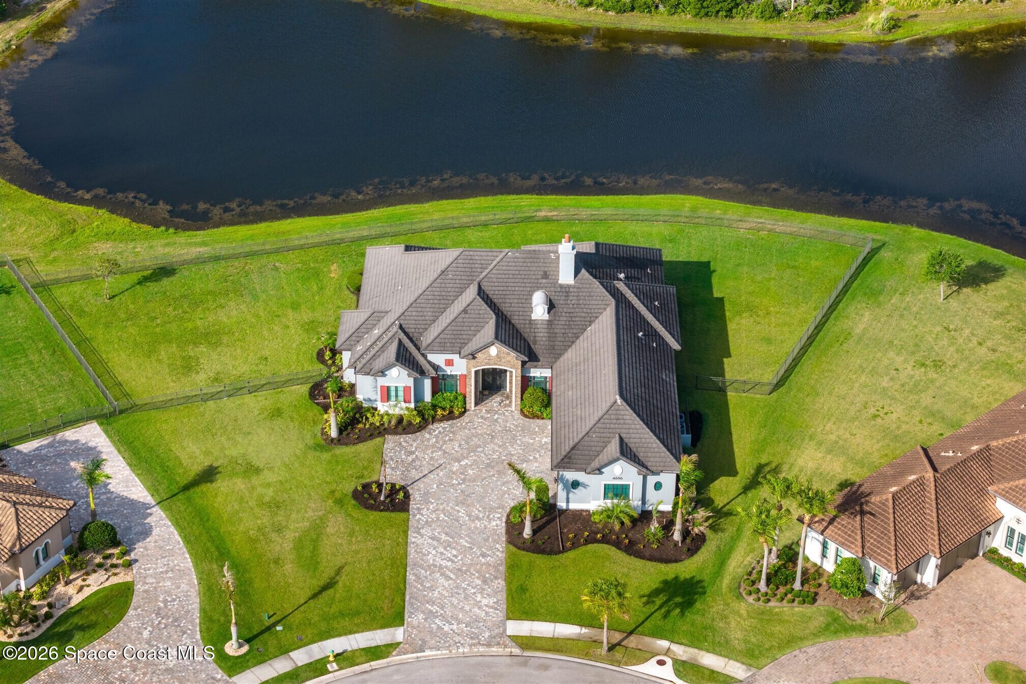 4696 Tea Tree Court Rockledge, FL 32955 - Photo 48 of 121 DJI_20260518085909_0007_D