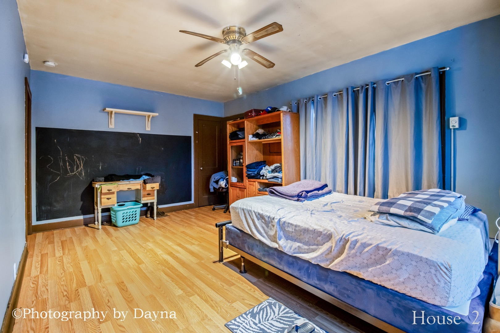 242 West Jeffery Street Kankakee, IL 60901 - Photo 13 of 39 a bedroom with a bed and a chandelier