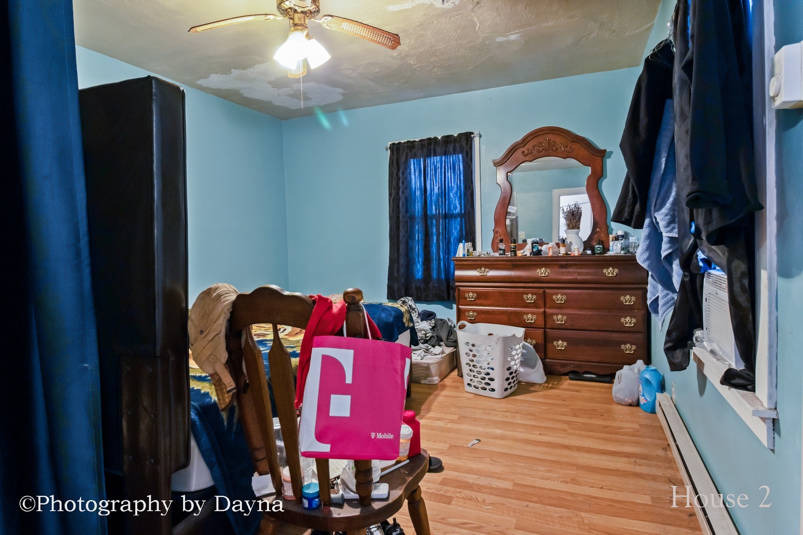 242 West Jeffery Street Kankakee, IL 60901 - Photo 16 of 39 a bedroom with a bed and a chandelier