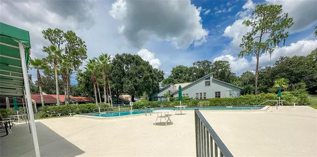 a view of house with outdoor space and street view