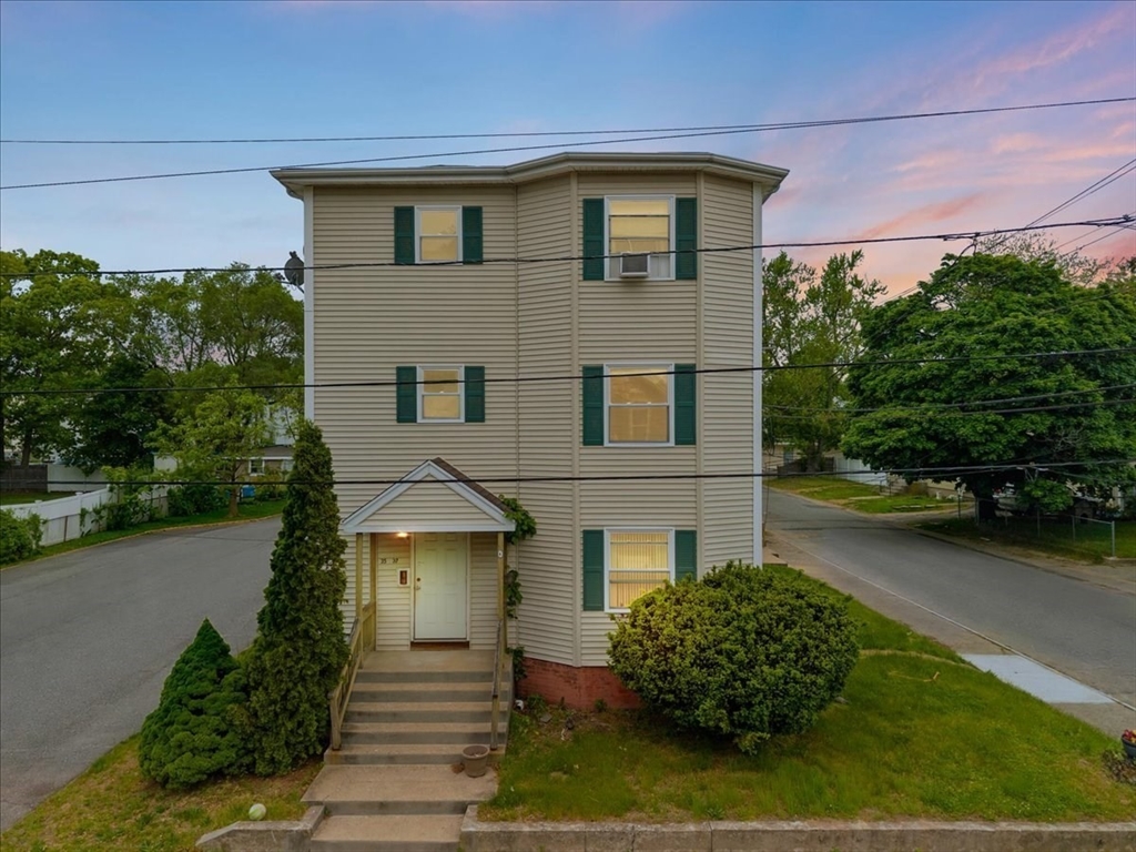35 Hazel Street, Unit B Attleboro, MA 02703 - Photo 1 of 21 a front view of a house with garden