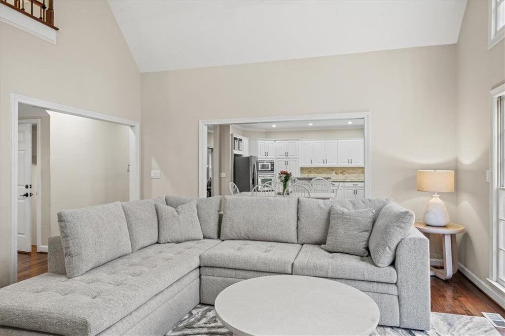 605 Pine Trail Pointe Roswell, GA 30075 - Photo 18 of 76 a living room with furniture and a large window