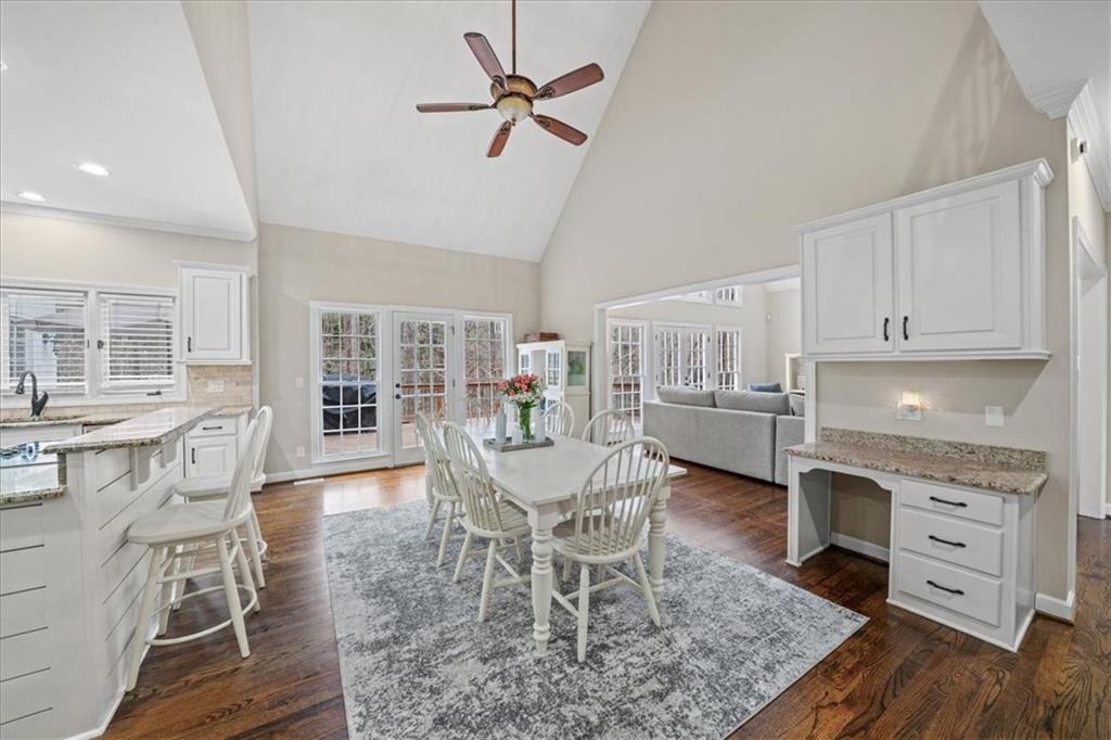 605 Pine Trail Pointe Roswell, GA 30075 - Photo 25 of 76 a view of a dining room with furniture window and wooden floor