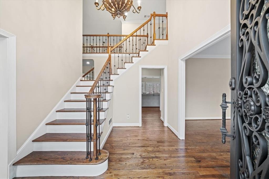 605 Pine Trail Pointe Roswell, GA 30075 - Photo 7 of 76 a view of entryway and hall with wooden floor