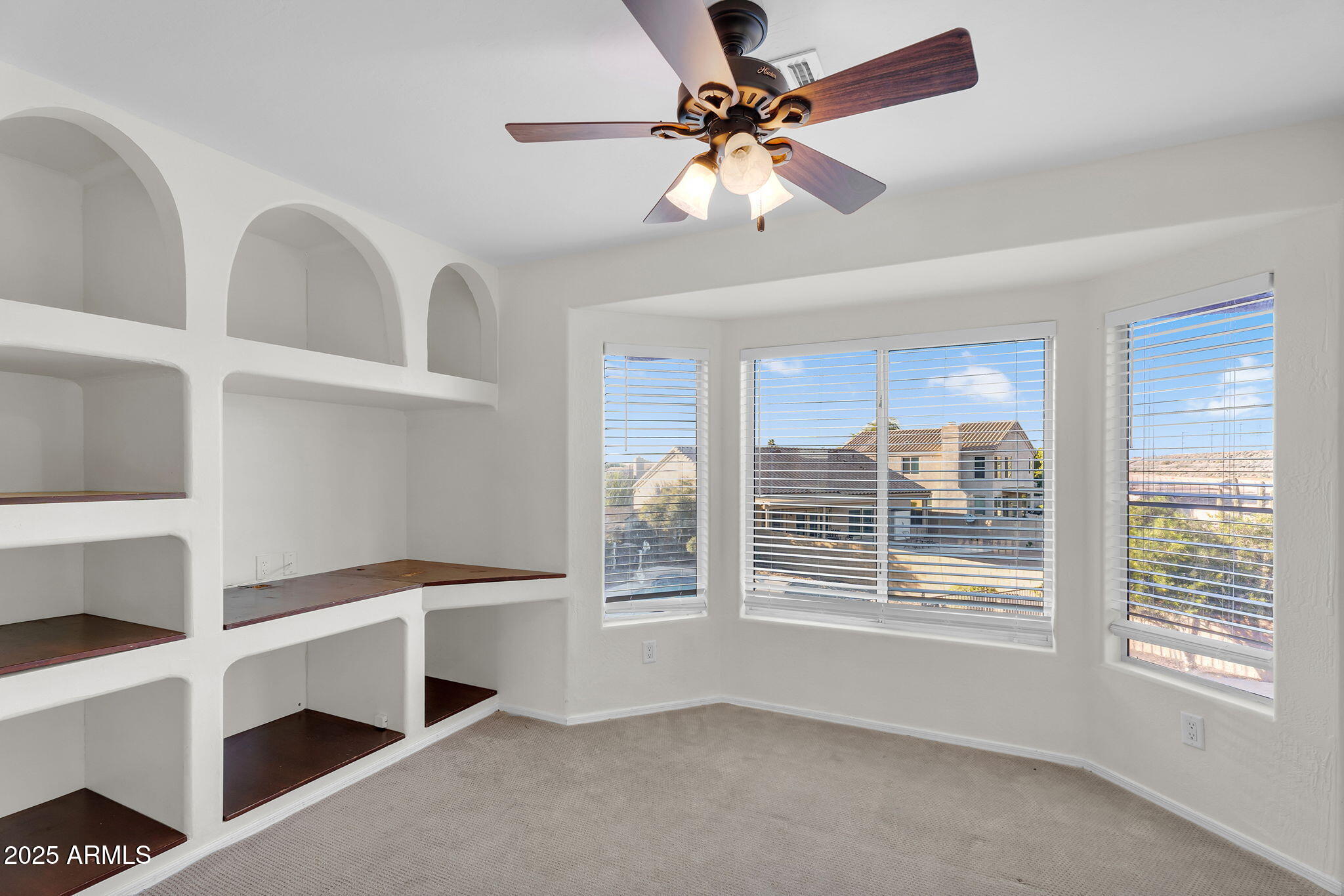 14566 North 100th Place Scottsdale, AZ 85260 - Photo 14 of 34 a view of an empty room with a window