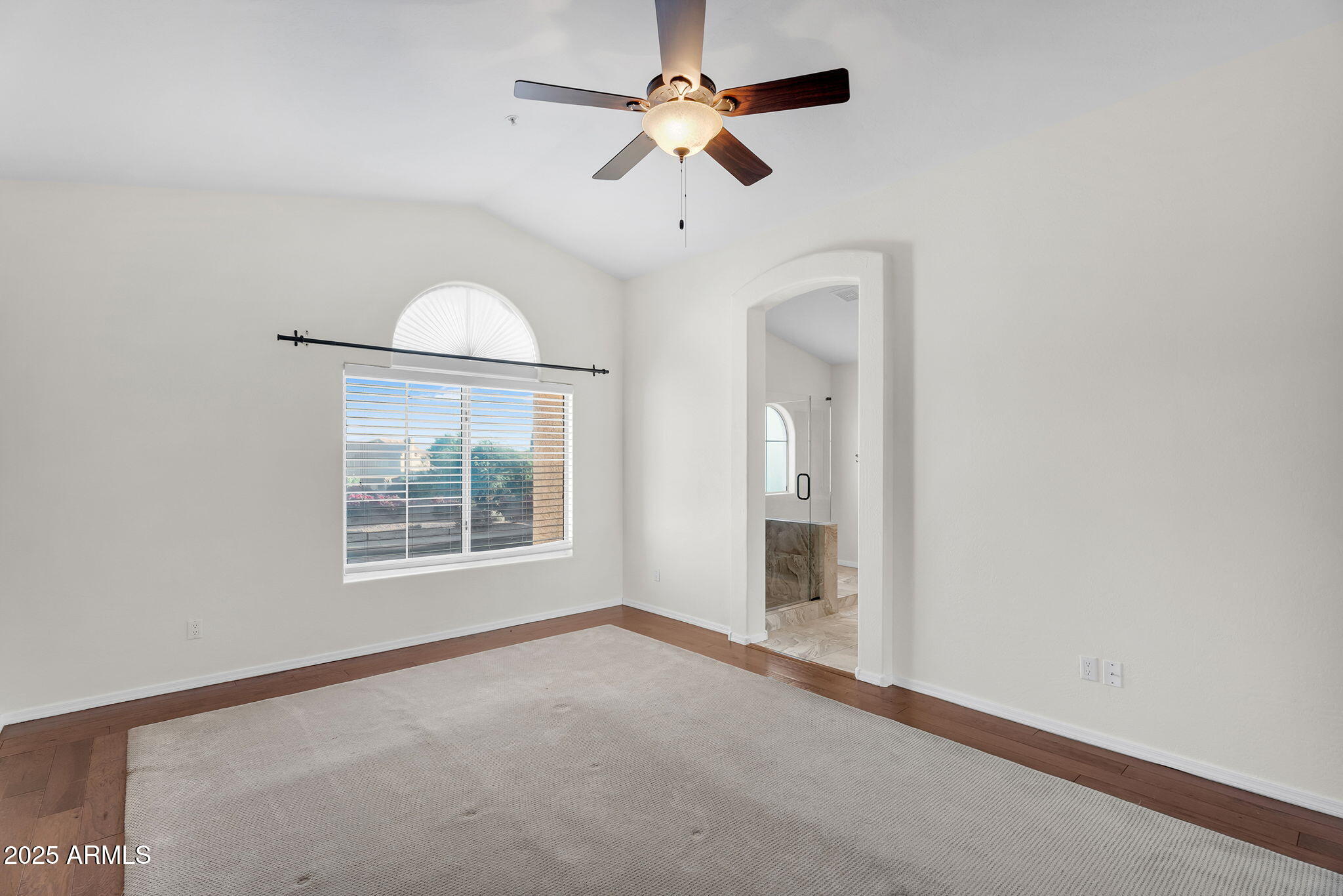 14566 North 100th Place Scottsdale, AZ 85260 - Photo 16 of 34 an empty room with windows and fan