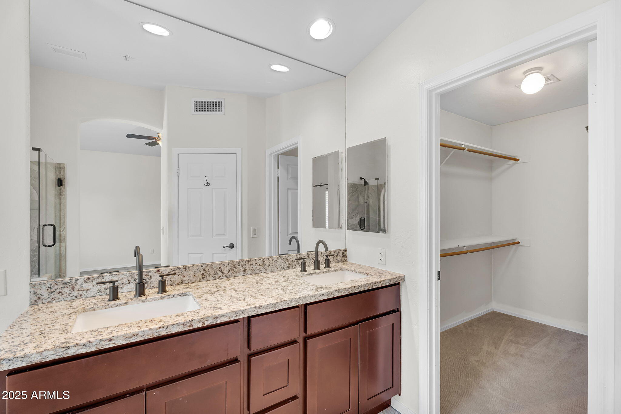 14566 North 100th Place Scottsdale, AZ 85260 - Photo 19 of 34 a bathroom with a granite countertop sink and a mirror