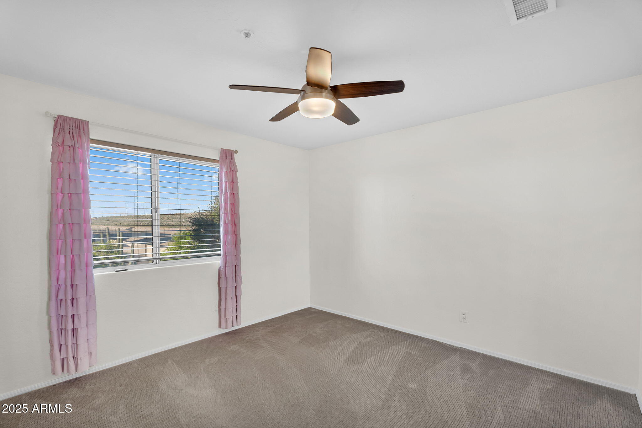14566 North 100th Place Scottsdale, AZ 85260 - Photo 24 of 34 an empty room with a window