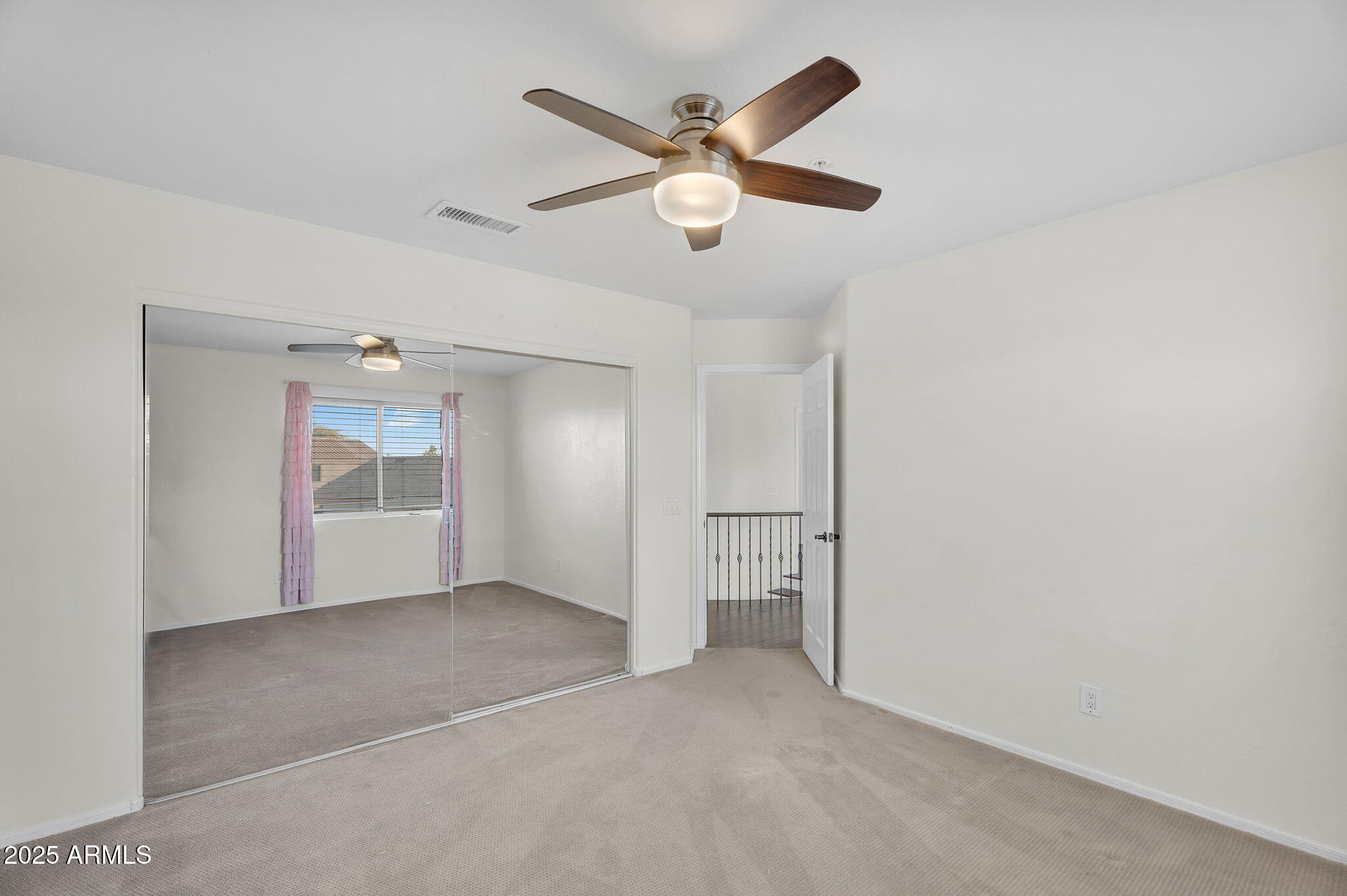 14566 North 100th Place Scottsdale, AZ 85260 - Photo 25 of 34 an empty room and chandelier fan