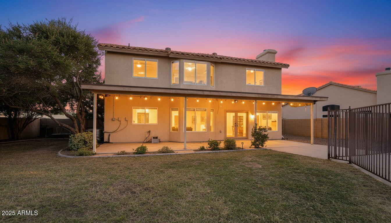 14566 North 100th Place Scottsdale, AZ 85260 - Photo 29 of 34 a front view of a house with a yard