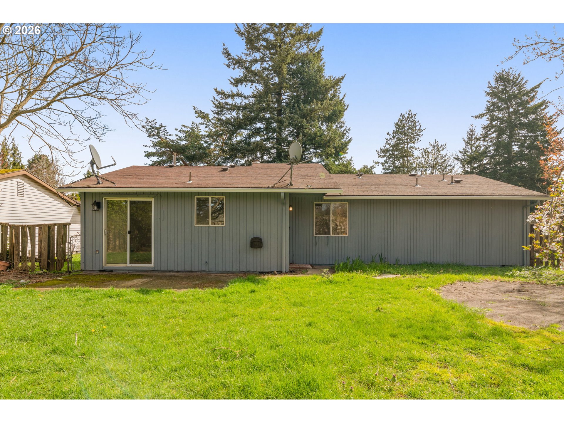 2635 Southeast 170th Avenue Portland, OR 97236 - Photo 19 of 22 a view of a house with a yard