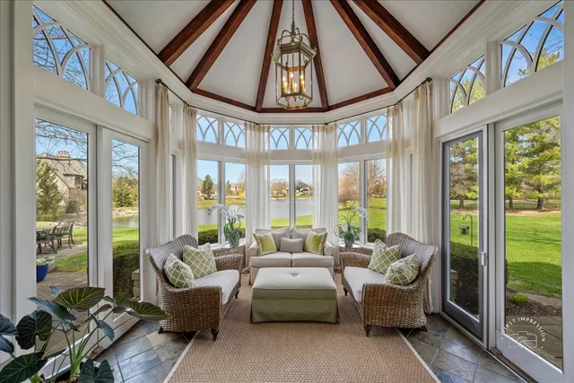 a bathroom with a granite countertop sink toilet and mirror