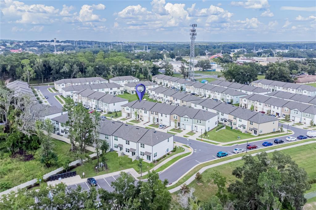 6174 Daerr Rdg Street Zephyrhills, FL 33542 - Photo 23 of 41 an aerial view of residential houses with outdoor space and street view