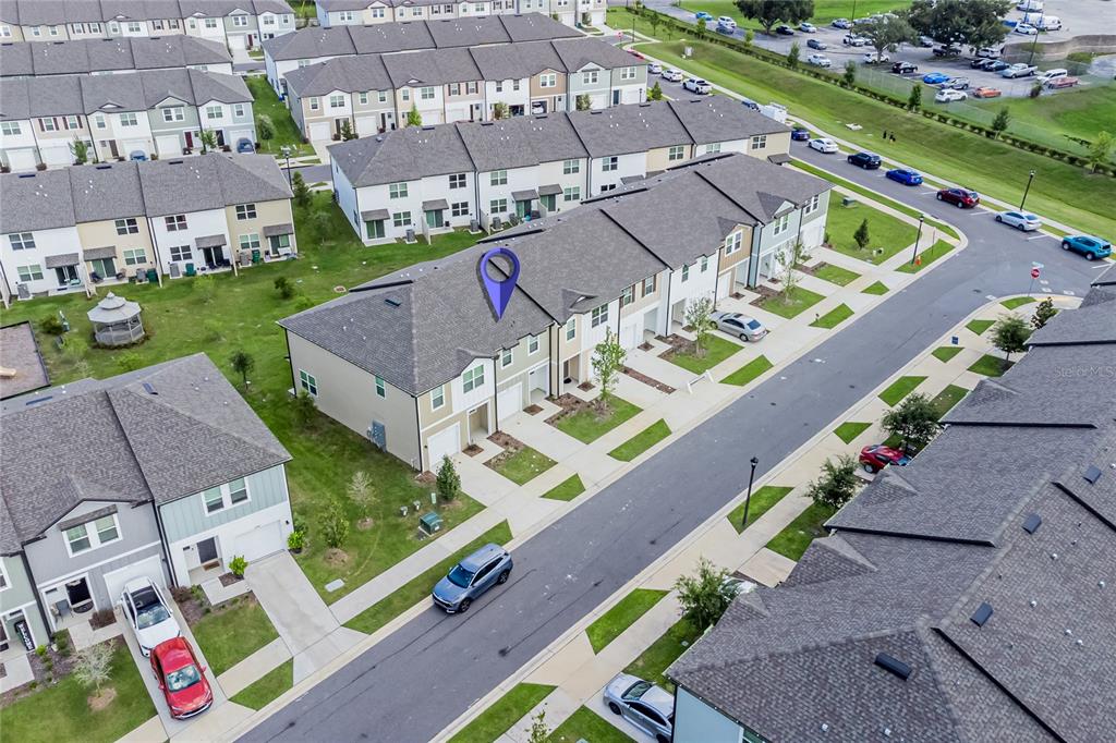 6174 Daerr Rdg Street Zephyrhills, FL 33542 - Photo 26 of 41 an aerial view of a house with a garden