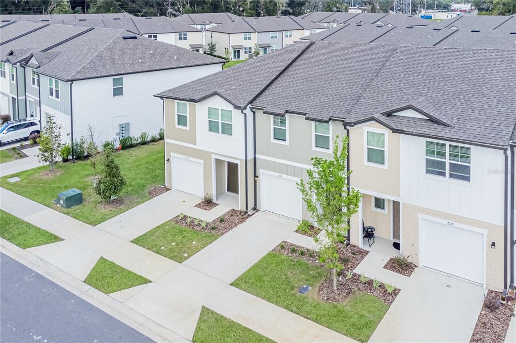 6174 Daerr Rdg Street Zephyrhills, FL 33542 - Photo 4 of 41 a aerial view of a house with garden