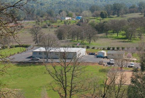 2679 Salmon Court, Unit 3 Copperopolis, CA 95228 - Photo 3 of 6 a view of a lake with a yard