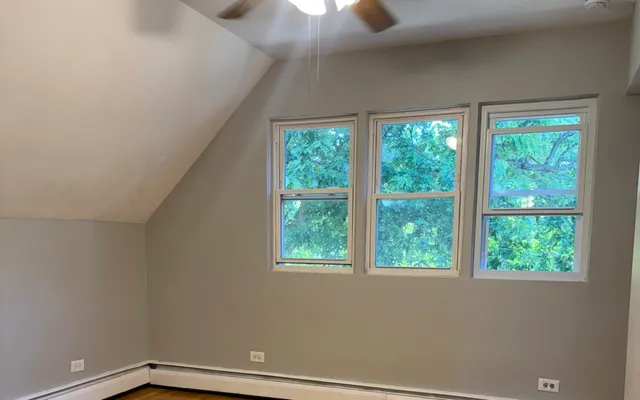 a view of a room that has a window in it