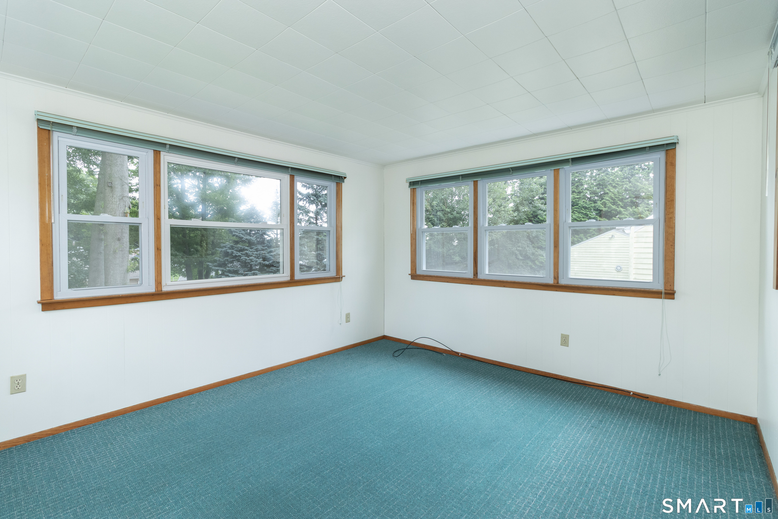 17 Honor Road West Haven, CT 06516 - Photo 20 of 40 Lots of natural light with windows on each side of the sun room.