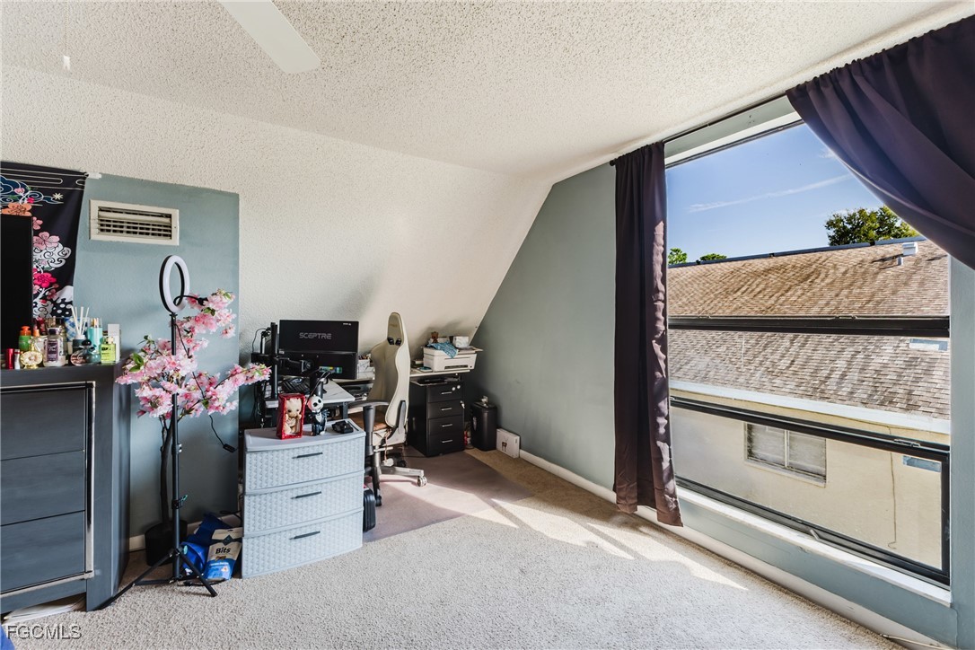 7393 Albany Road Fort Myers, FL 33967 - Photo 12 of 37 a view of a room with toys