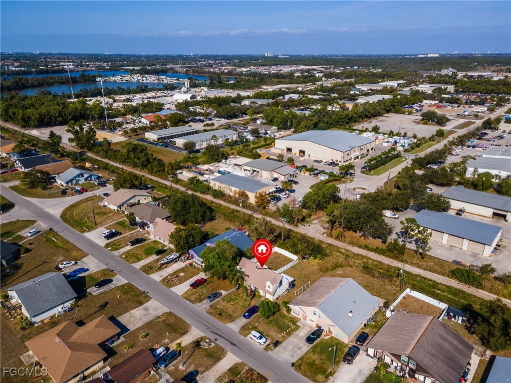 7393 Albany Road Fort Myers, FL 33967 - Photo 35 of 37 an aerial view of residential houses with city view