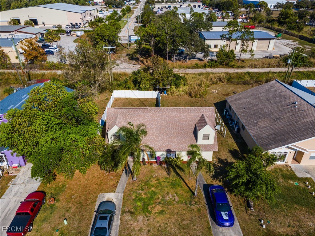 7393 Albany Road Fort Myers, FL 33967 - Photo 36 of 37 an aerial view of houses with outdoor space