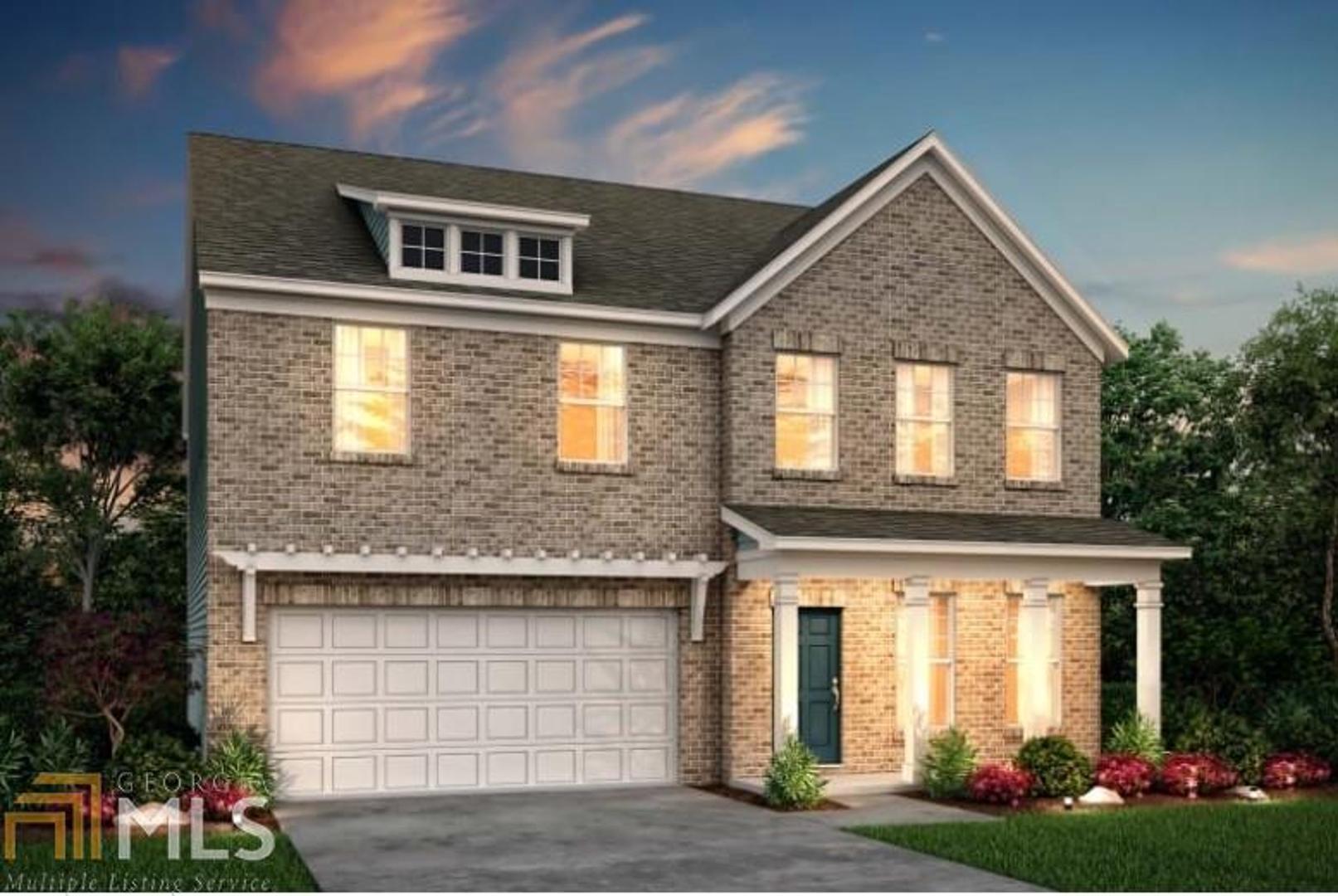 6099 Wheeler Ridge Road Auburn, GA 30011 - Photo 1 of 1 a front view of a house with garden
