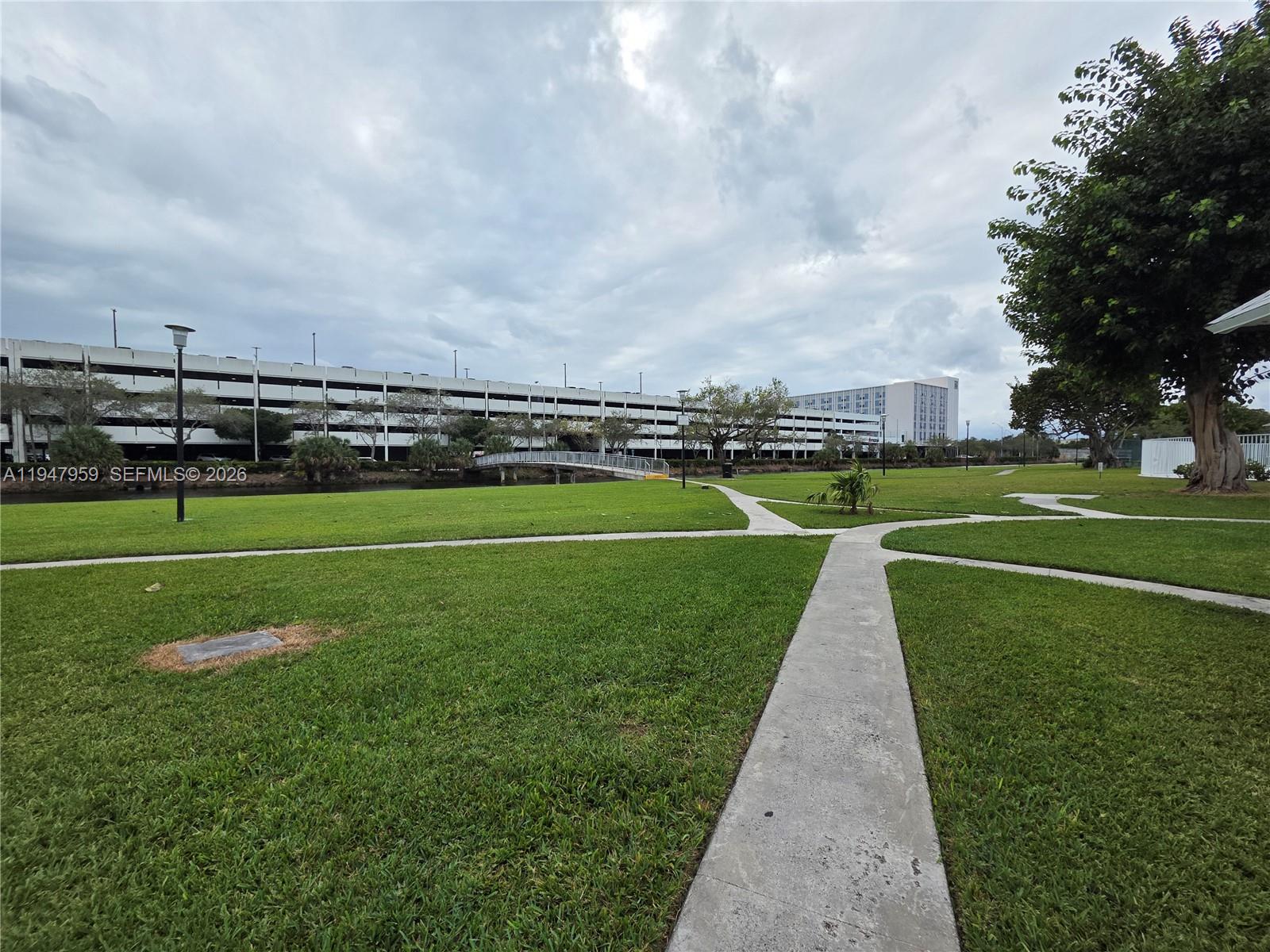 7424 Southwest 82nd Street, Unit D215 Miami, FL 33143 - Photo 30 of 33 a view of a golf course
