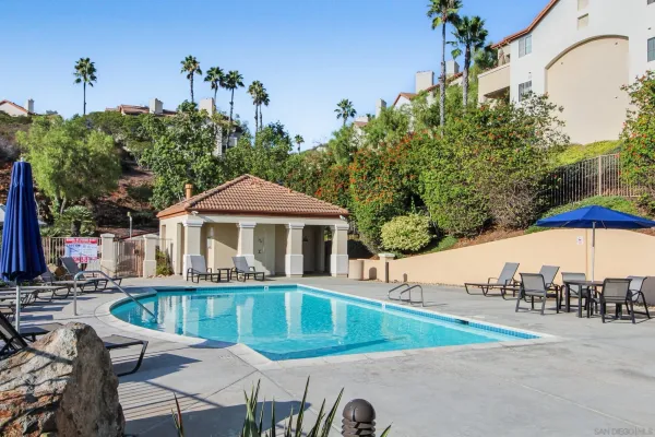 a view of a swimming pool with a patio