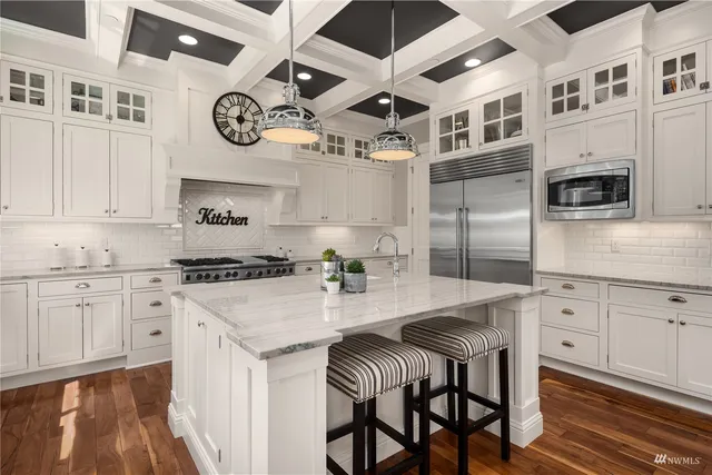 a kitchen with a sink cabinets and window