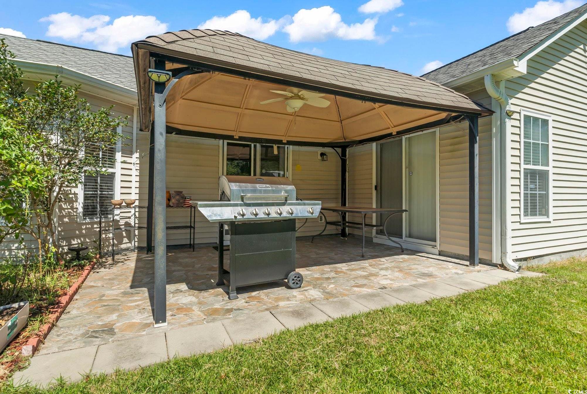 717 West Perry Road Myrtle Beach, SC 29579 - Photo 24 of 29 View of tiled patio/terrace with a grill, a gazebo, and a ceiling fan