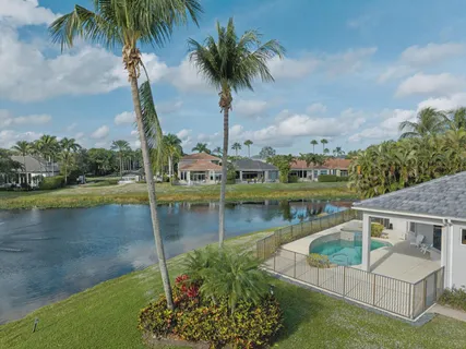 a view of a garden with a lake view