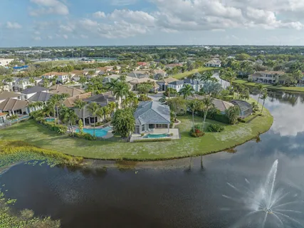a view of a lake with a building in the background