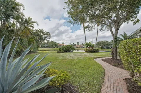 a view of a golf course with a fountain