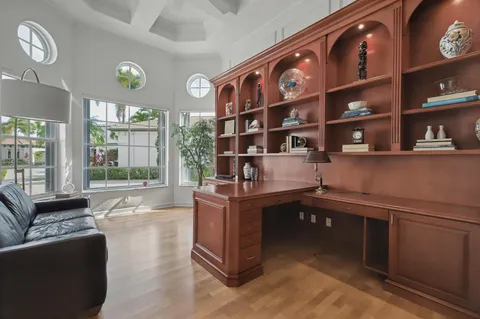 a room with furniture cabinets and window