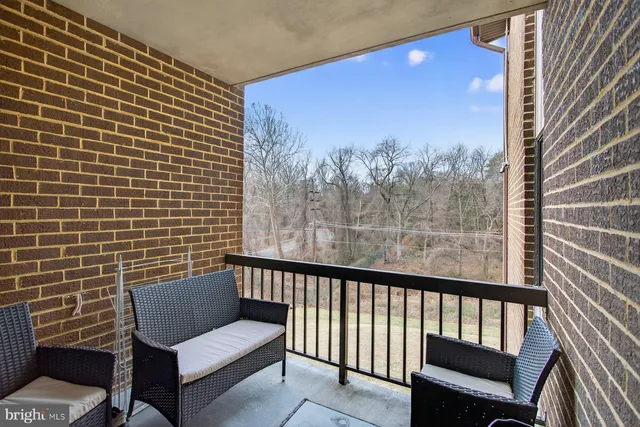 a view of a chair in a balcony