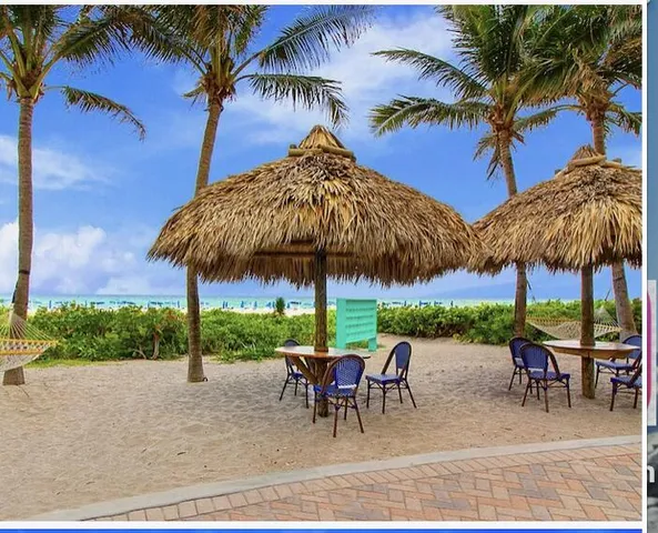 a view of a backyard with a sitting area and furniture