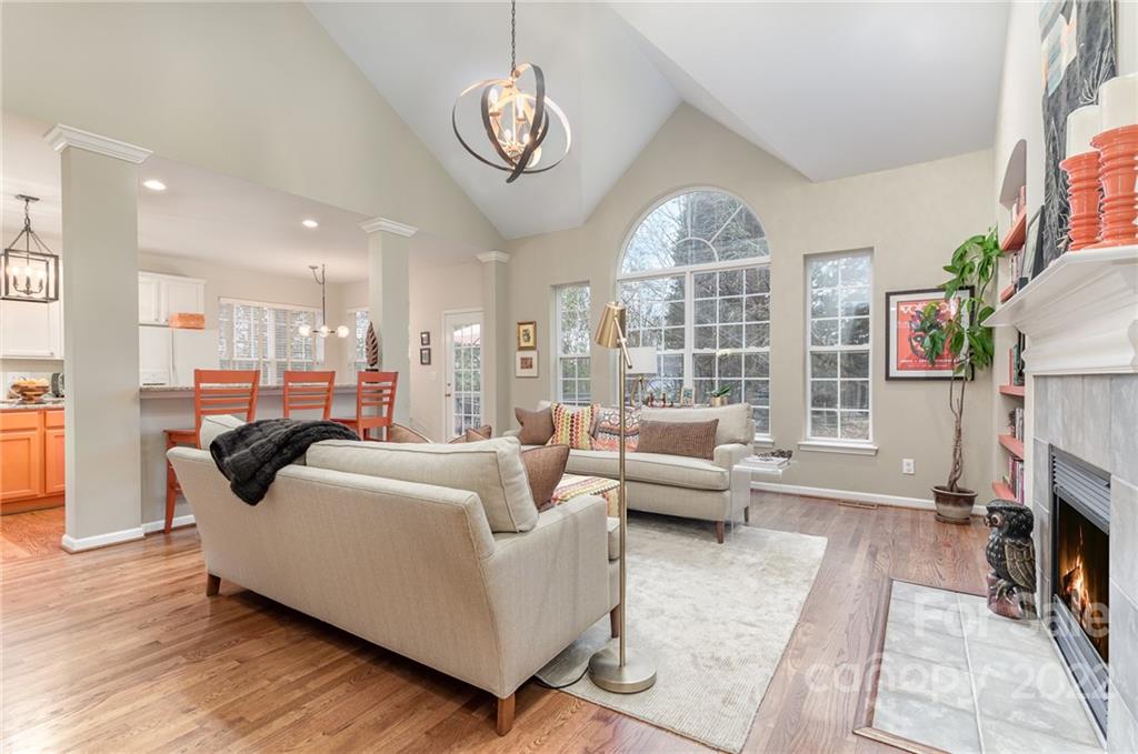 320 Brixham Place Fort Mill, SC 29708 - Photo 7 of 35 a living room with fireplace furniture and a large window