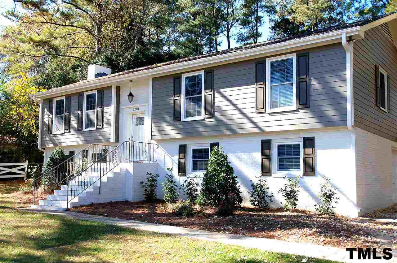 2701 Wycliff Road Raleigh, NC 27607 - Photo 1 of 16 Exterior of home has new hardiplank, new fresh paint palette, new shutters, front door and lighting. Exterior Front