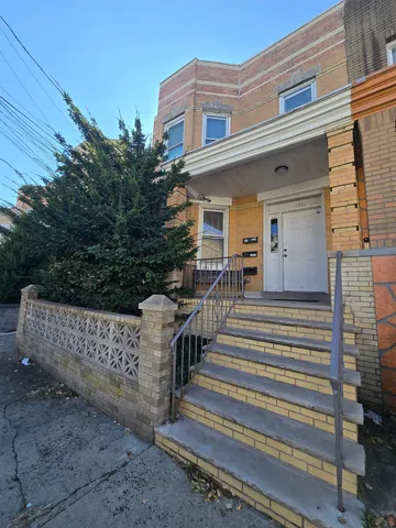a view of a entrance with stairs
