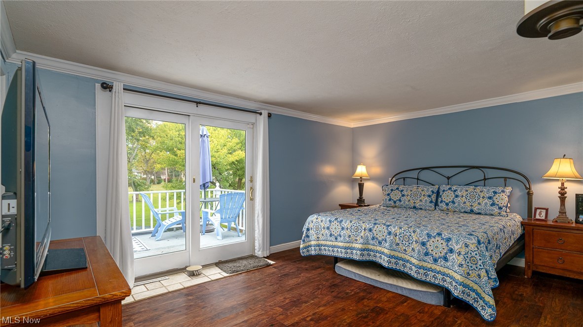 301 Perry Drive Northwest Canton, OH 44708 - Photo 27 of 34 Master bedroom with access to deck