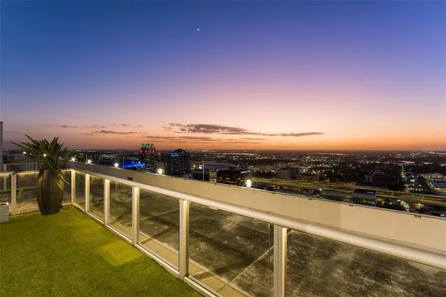 a swimming pool with outdoor seating and yard