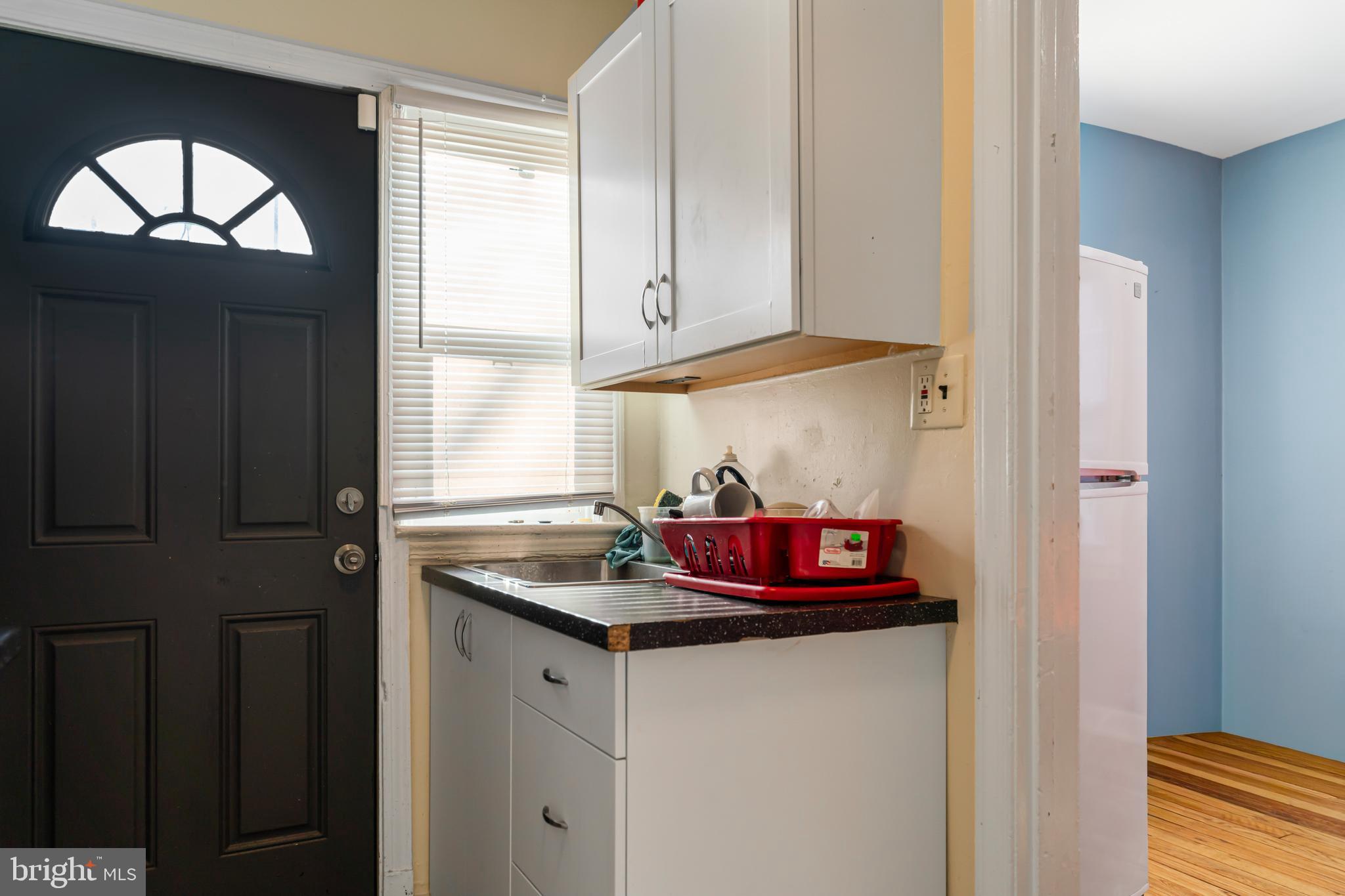 4801 B Street Southeast Washington, DC 20019 - Photo 11 of 43 a kitchen with a sink and a cabinets