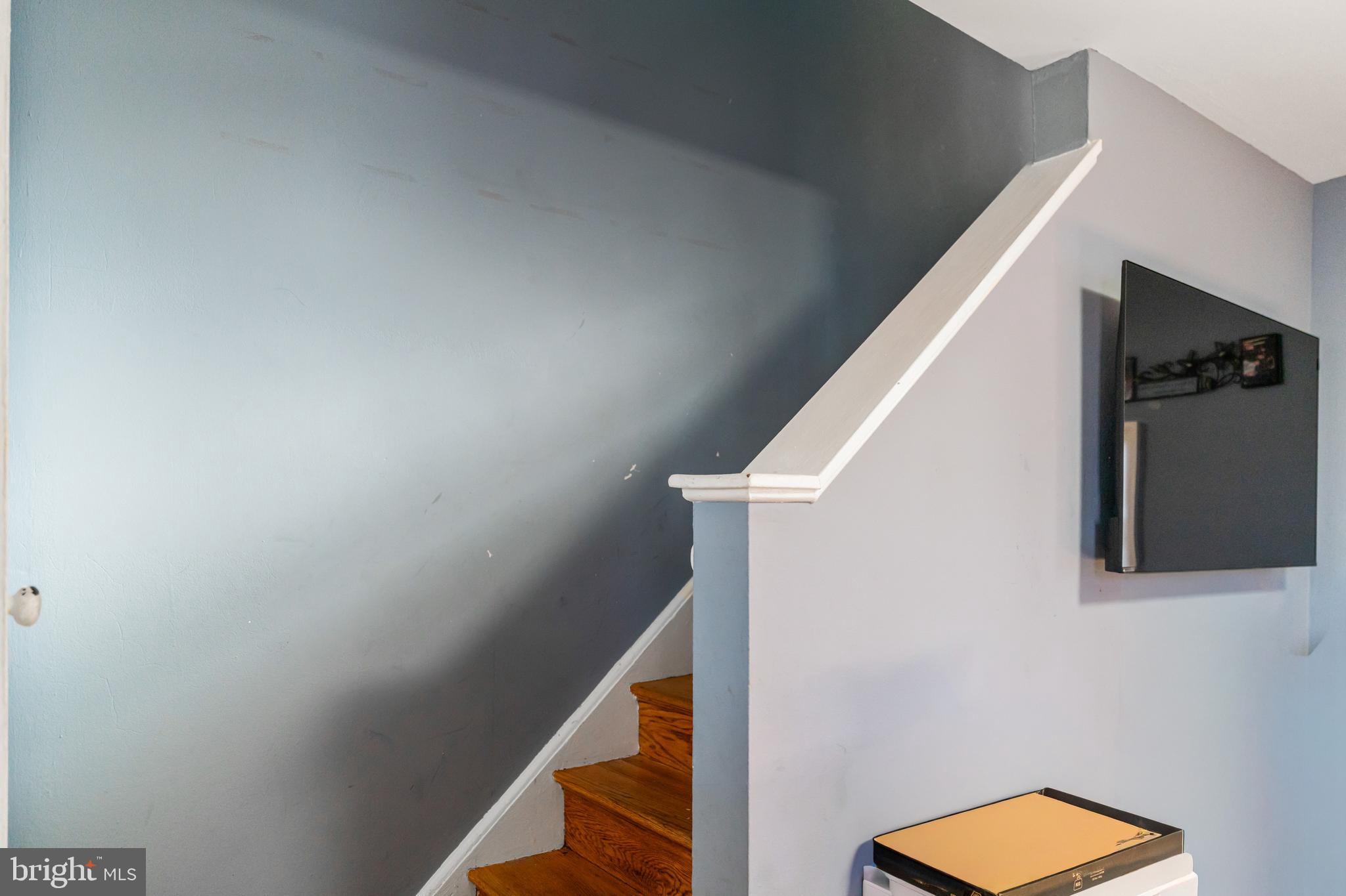 4801 B Street Southeast Washington, DC 20019 - Photo 12 of 43 a view of a hallway with staircase