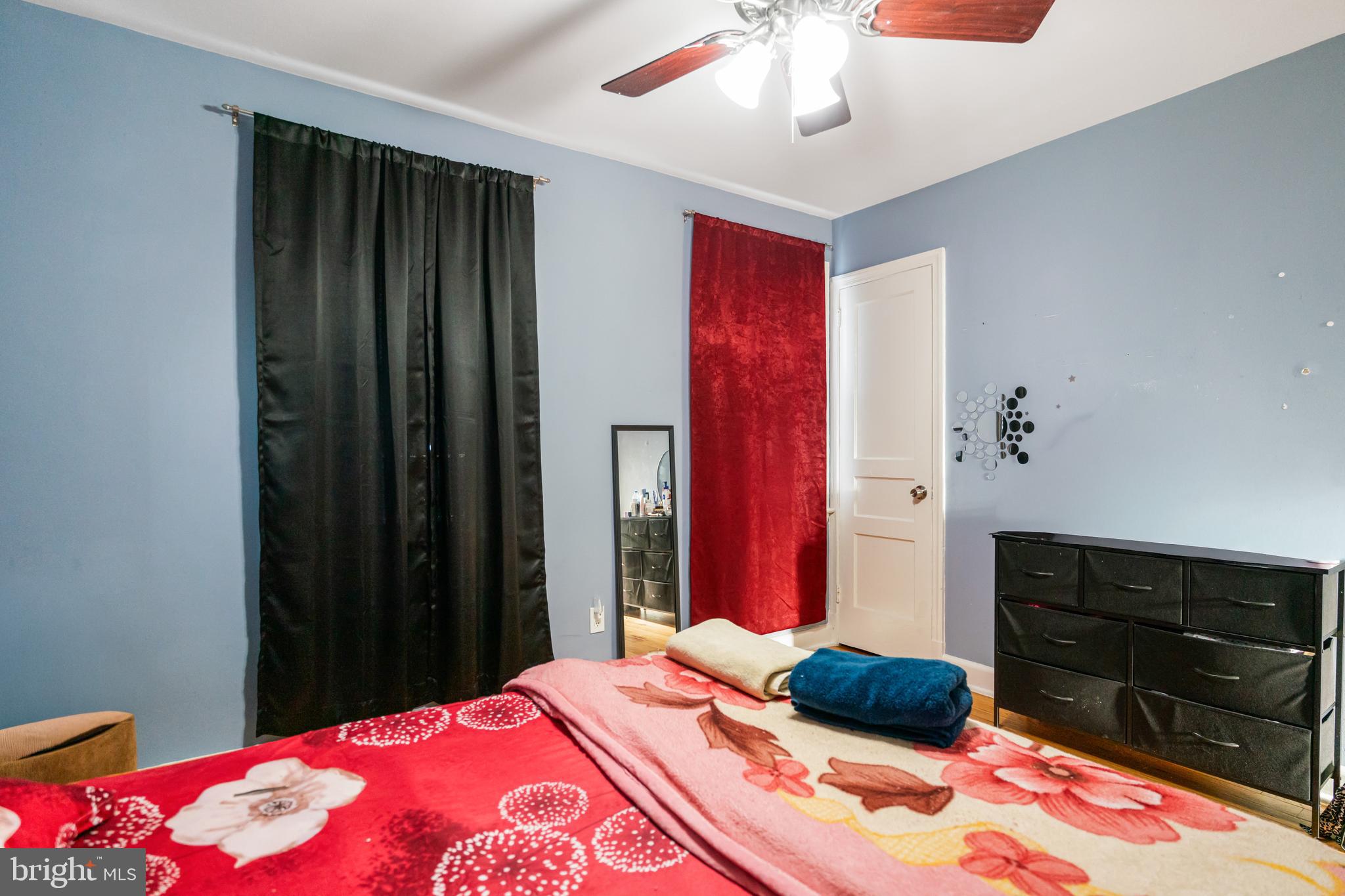 4801 B Street Southeast Washington, DC 20019 - Photo 20 of 43 a bedroom with a bed and a dresser