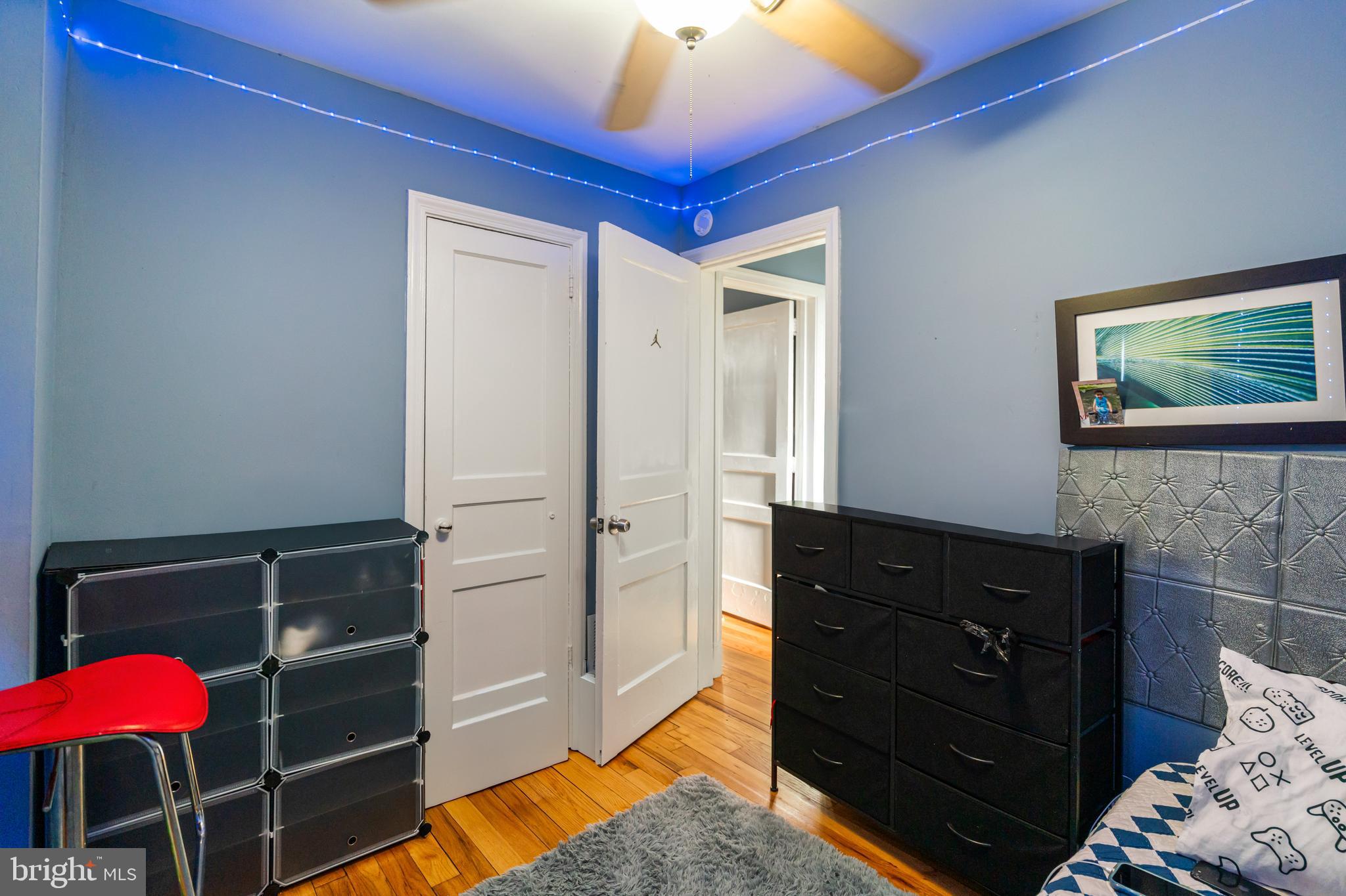 4801 B Street Southeast Washington, DC 20019 - Photo 22 of 43 a bedroom with a bed and a dresser