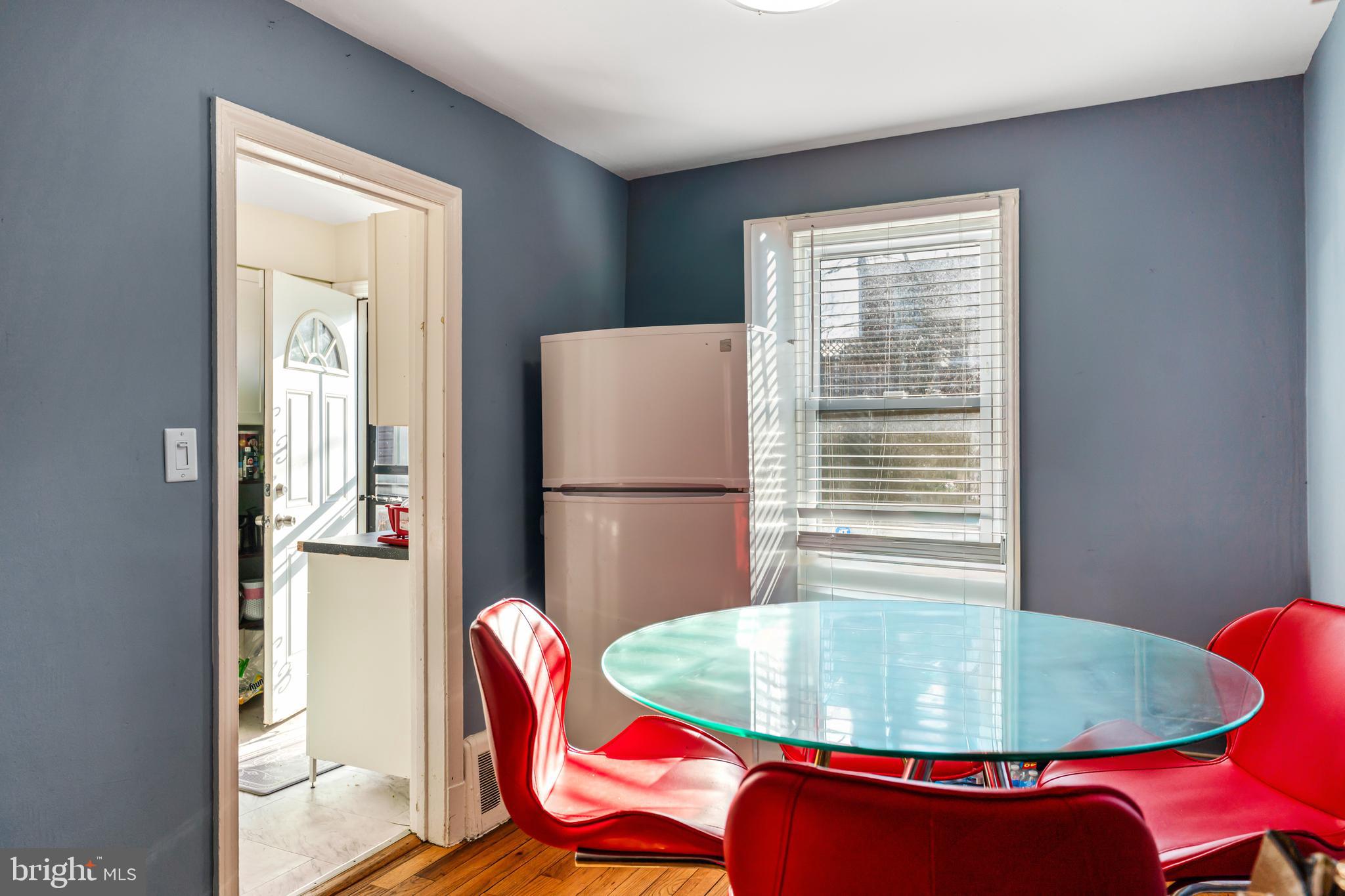 4801 B Street Southeast Washington, DC 20019 - Photo 5 of 43 a dining room with a table and chairs