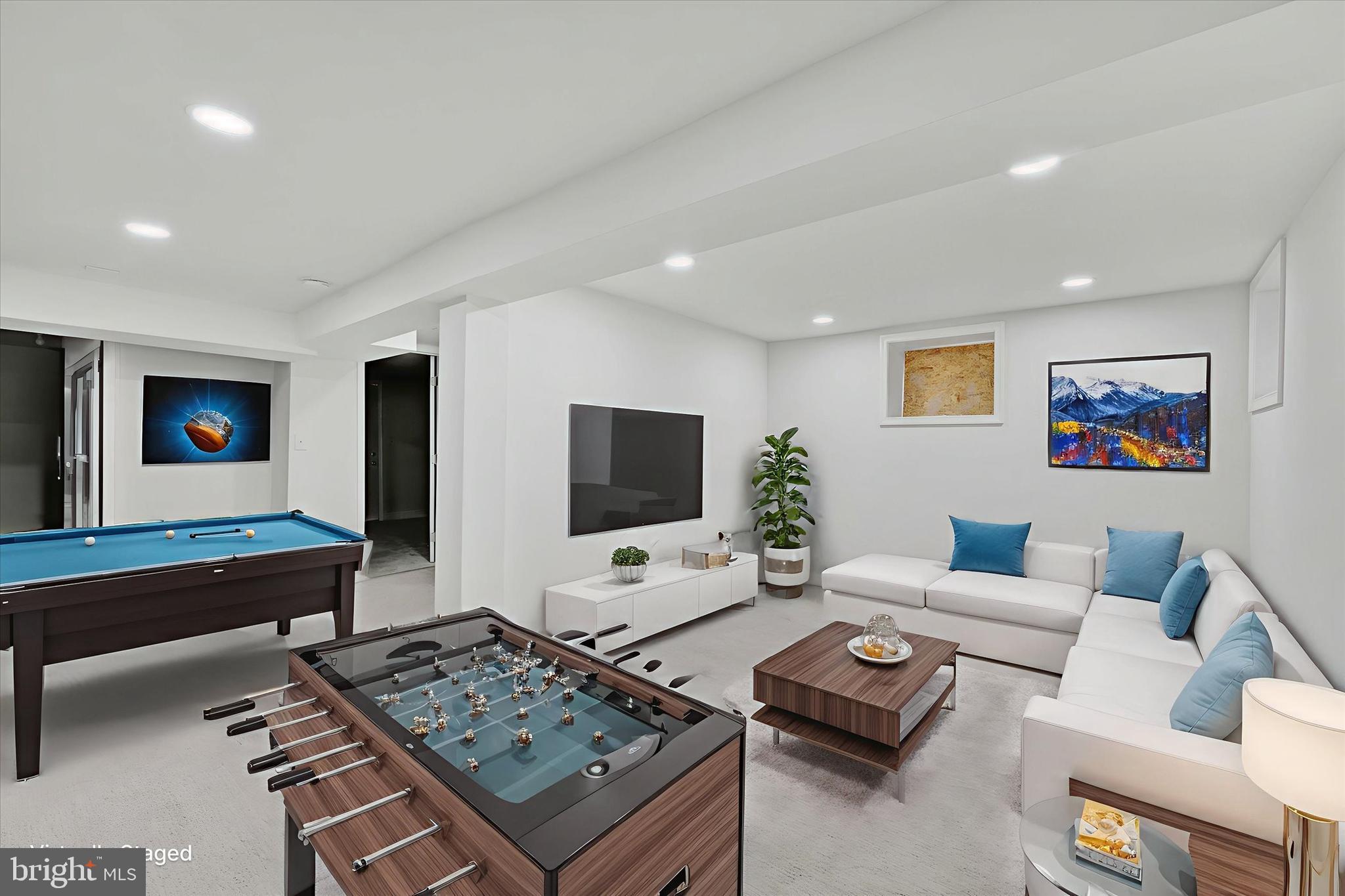 2400 West Lafayette Avenue Baltimore, MD 21216 - Photo 23 of 33 a living room with furniture and a flat screen tv