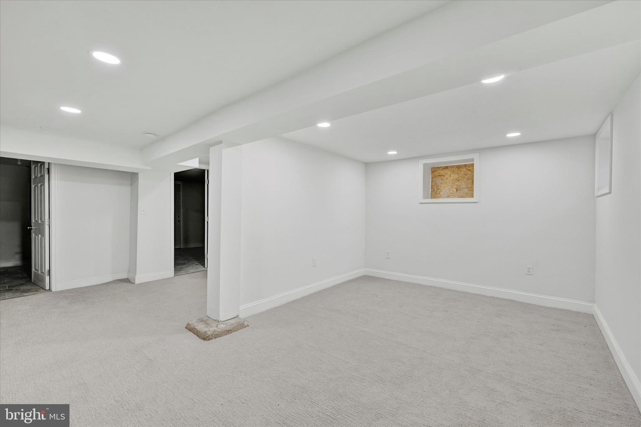 2400 West Lafayette Avenue Baltimore, MD 21216 - Photo 24 of 33 a view of an empty room with a window