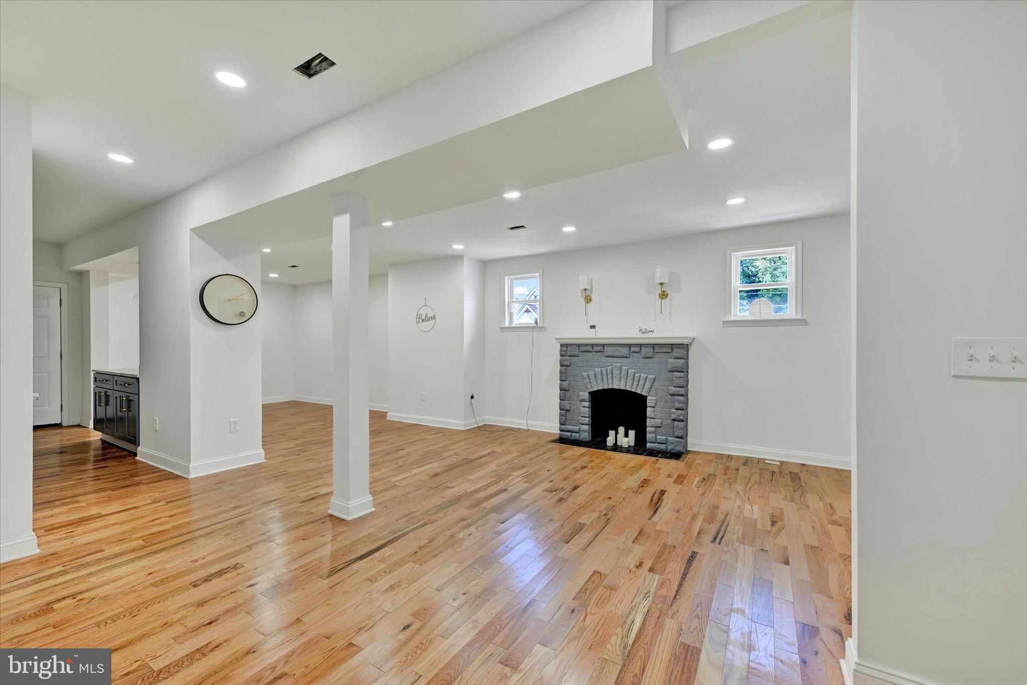 2400 West Lafayette Avenue Baltimore, MD 21216 - Photo 3 of 33 a view of a livingroom with a fireplace